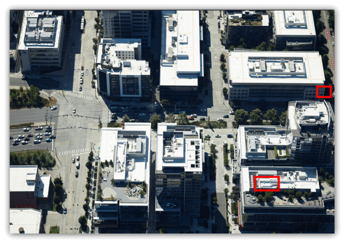 Aerial view of a city with many buildings AI-generated content may be incorrect.