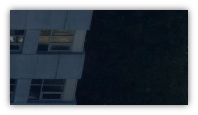 A building with windows at night AI-generated content may be incorrect.